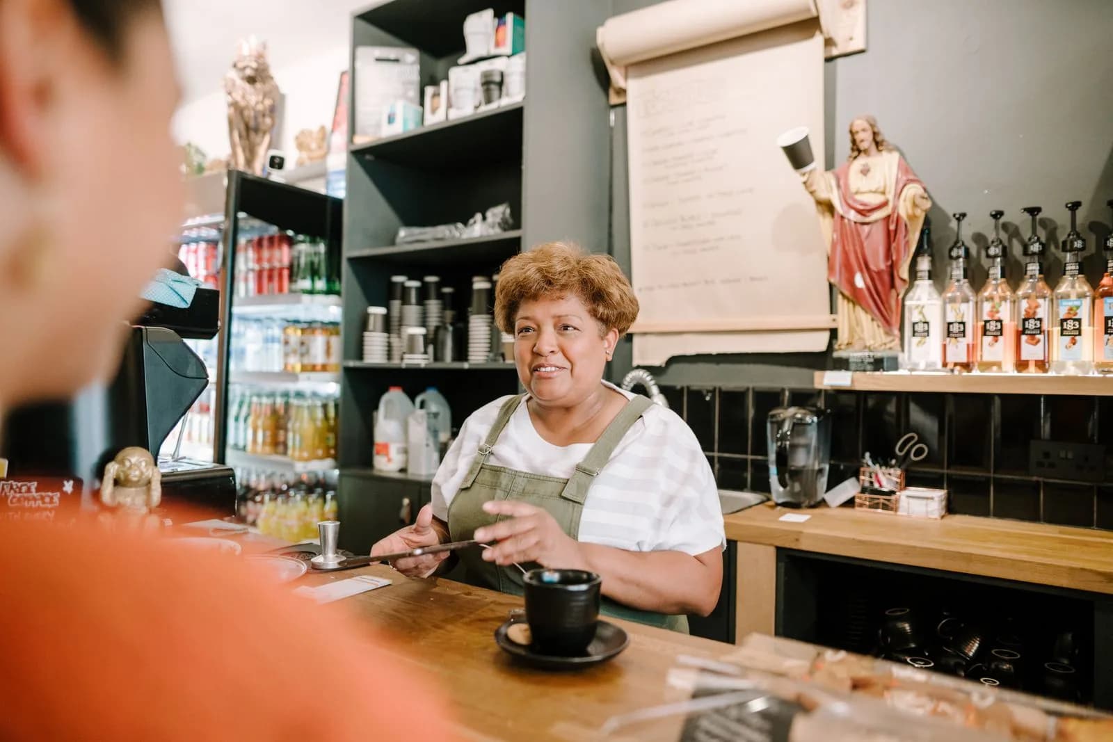 Dispensary staff advising customer — Cannabis & CBD marketing by TML Agency