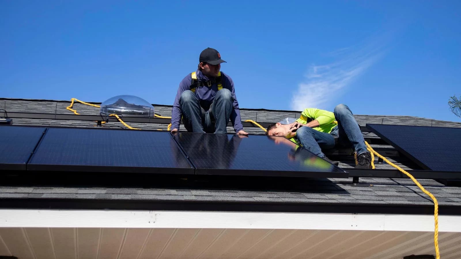 Solar installers rooftop — Clean Energy & Sustainability marketing by TML Agency