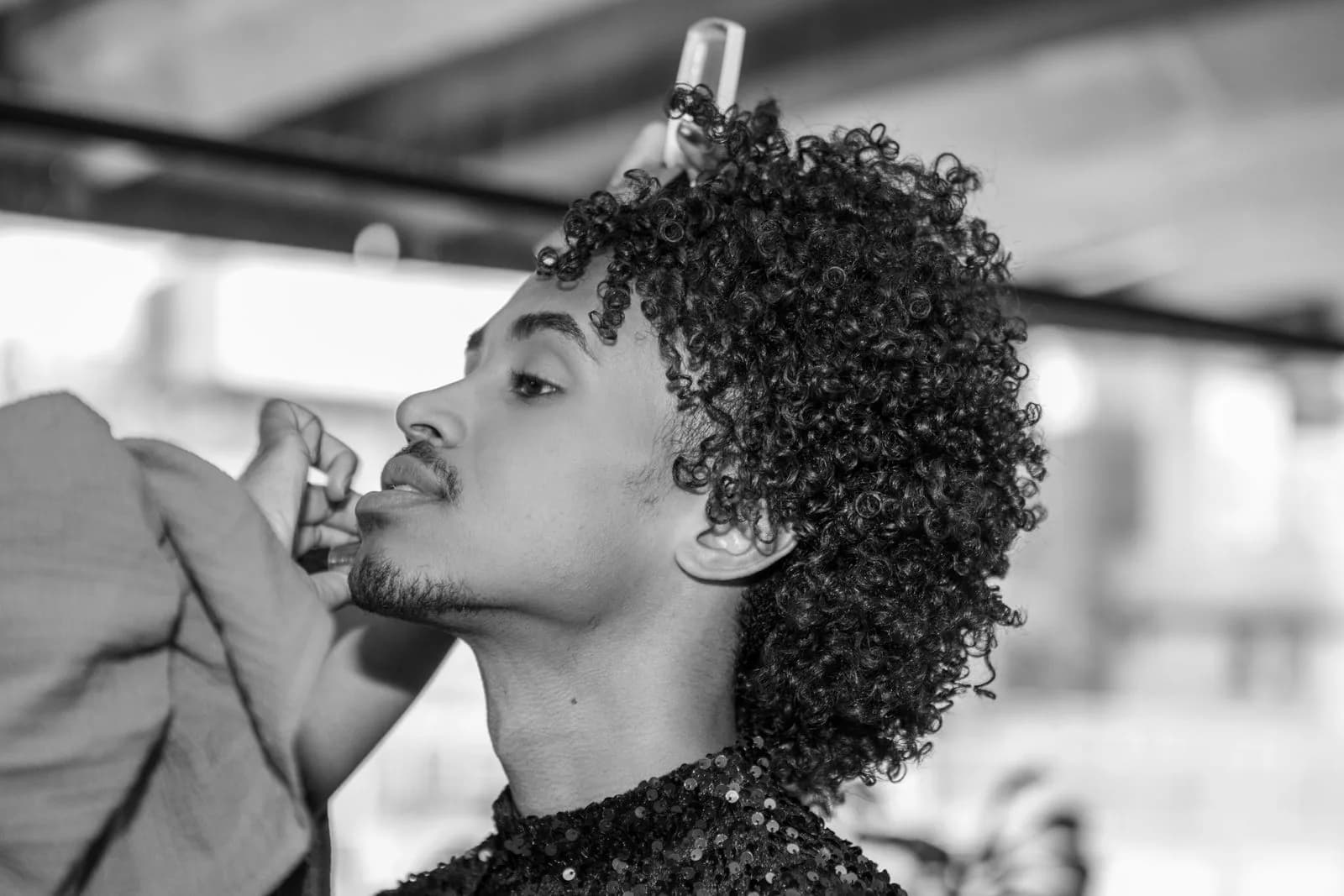 Stylist finishing hairstyle — Hair Salons marketing by TML Agency
