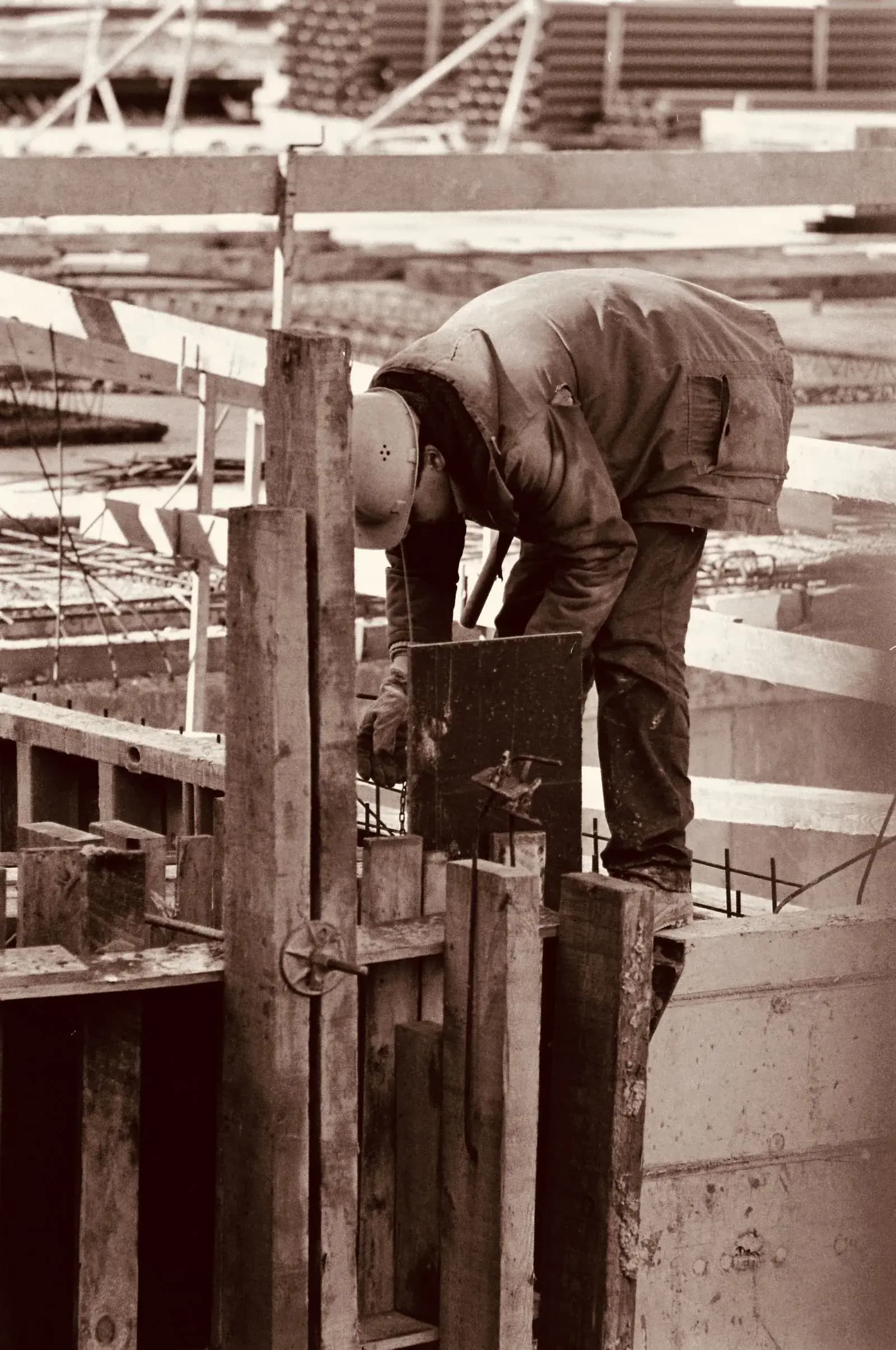 Workers building patio — Landscaping Companies marketing by TML Agency