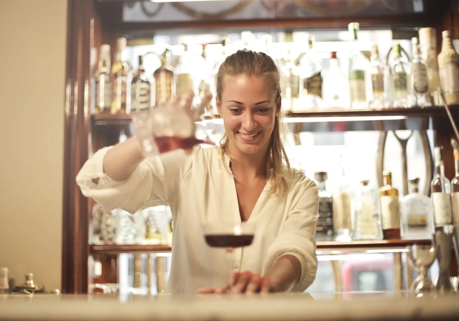 Bartender serving customer — Hospitality & Restaurants marketing by TML Agency