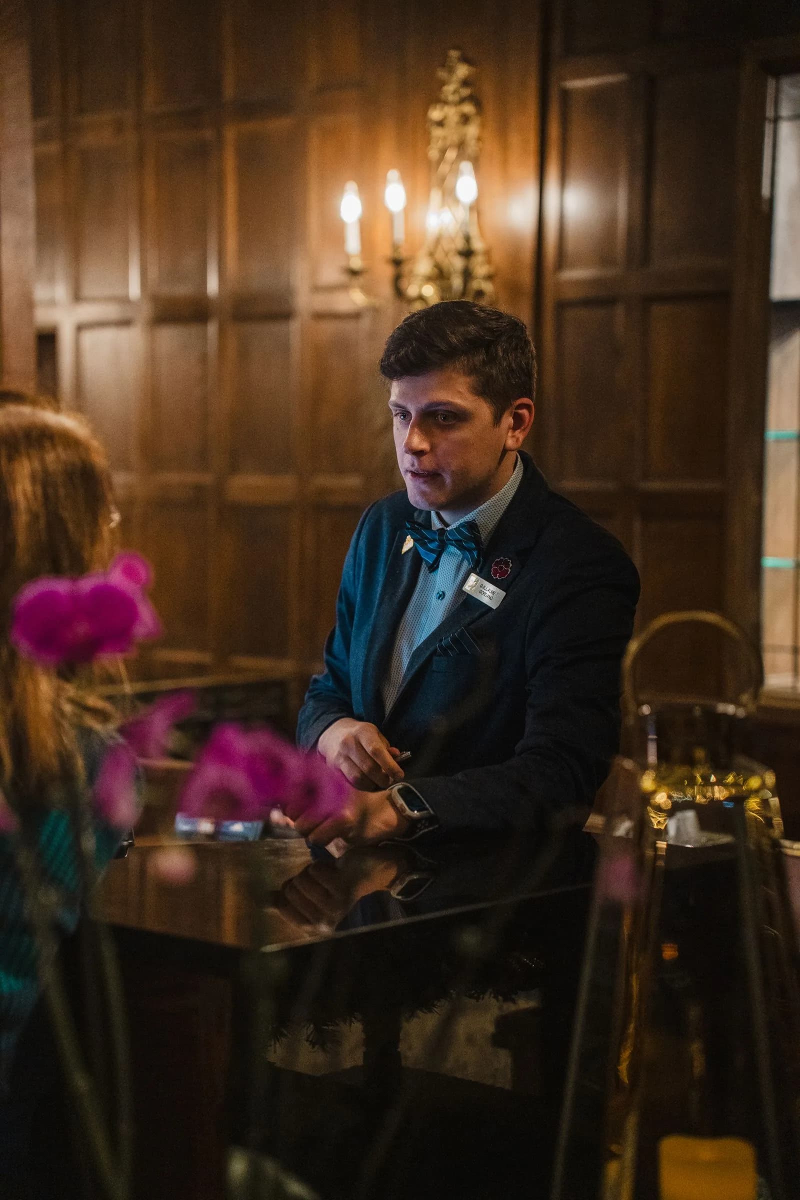 Hotel concierge helping guests — Hospitality & Restaurants marketing by TML Agency