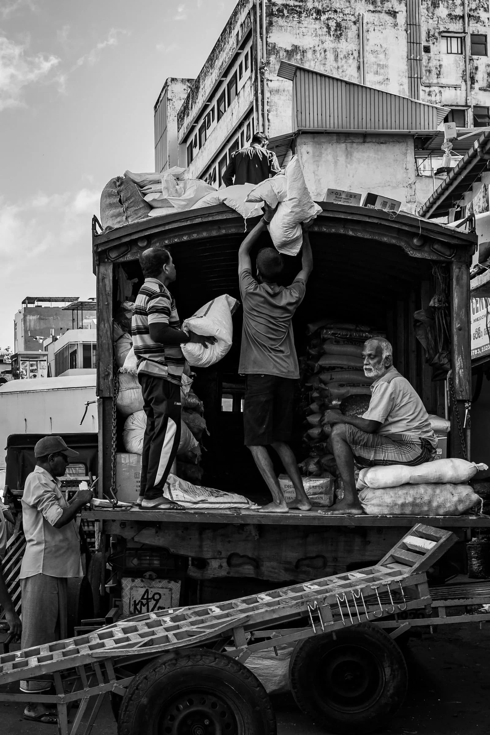 Workers loading truck — Logistics & Transportation marketing by TML Agency